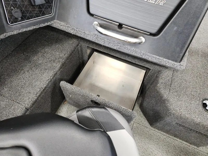 Slide: The Image of Open storage compartment in Crestliner 1850 Fish Hawk WT 2025. - 19