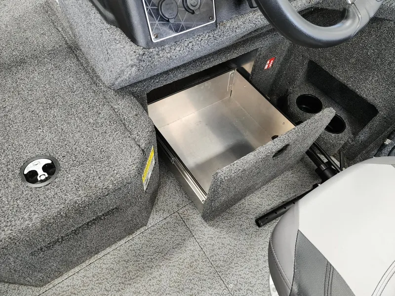 Slide: The Image of Interior of 2025 Crestliner 1850 Fish Hawk WT with open storage compartment. - 20