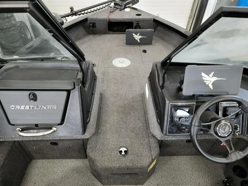 Slide: The Image of Interior view of 2025 Crestliner 1850 Fish Hawk WT boat. - 21