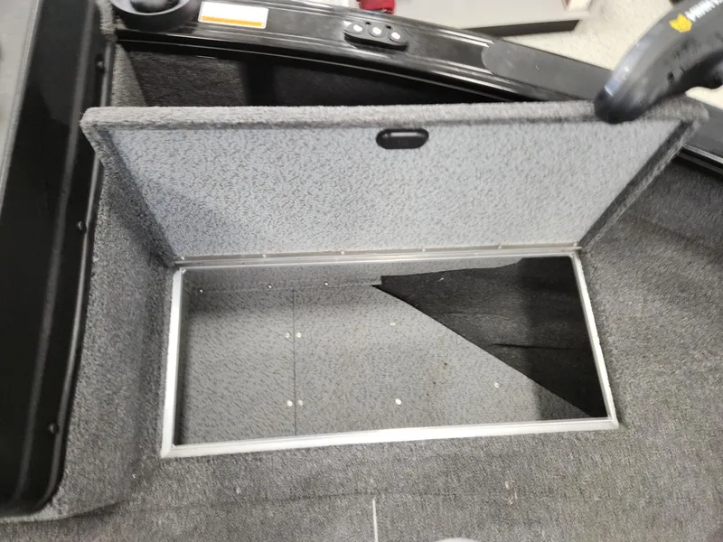 Slide: The Image of Open storage compartment in Crestliner 1850 Fish Hawk WT 2025. - 26