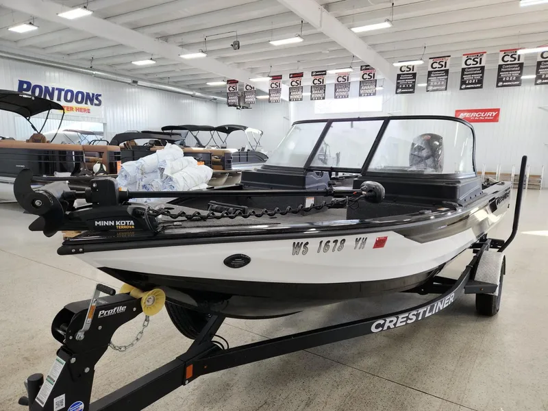 Slide: The Image of 2025 Crestliner 1850 Fish Hawk WT in showroom. - 3