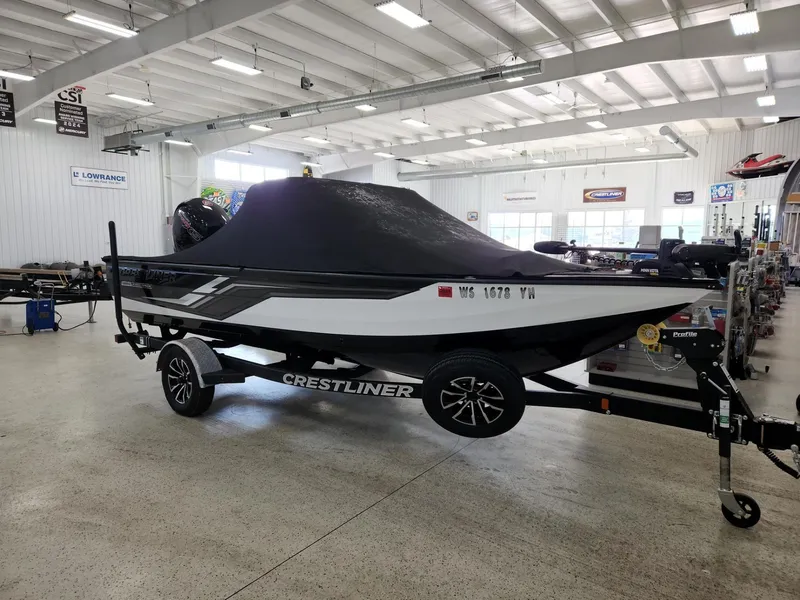 Slide: The Image of 2025 Crestliner 1850 Fish Hawk WT in showroom. - 6