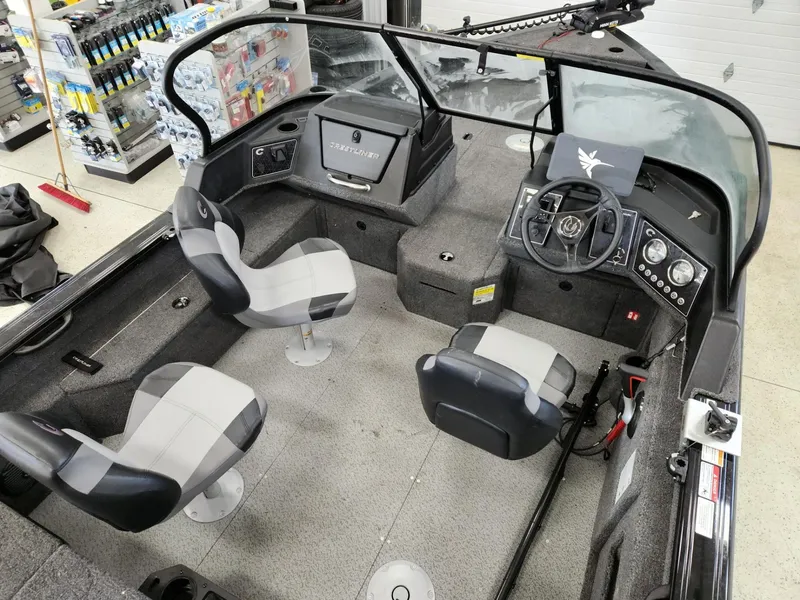 Slide: The Image of Interior of 2025 Crestliner 1850 Fish Hawk WT with four seats. - 8