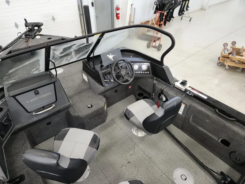Slide: The Image of Interior of 2025 Crestliner 1850 Fish Hawk WT with steering console. - 9