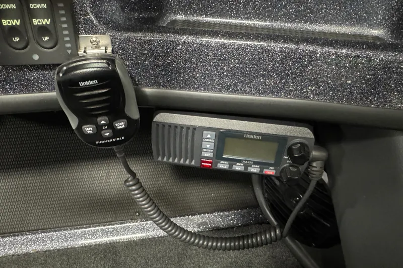 Slide: The Image of Uniden marine radio installed in 2022 Lund 202 Pro-V GL boat dashboard. - 15