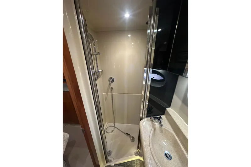 Slide: The Image of Shower and sink area in 2008 Cruisers Yachts 415 Express Motoryacht bathroom. - 15