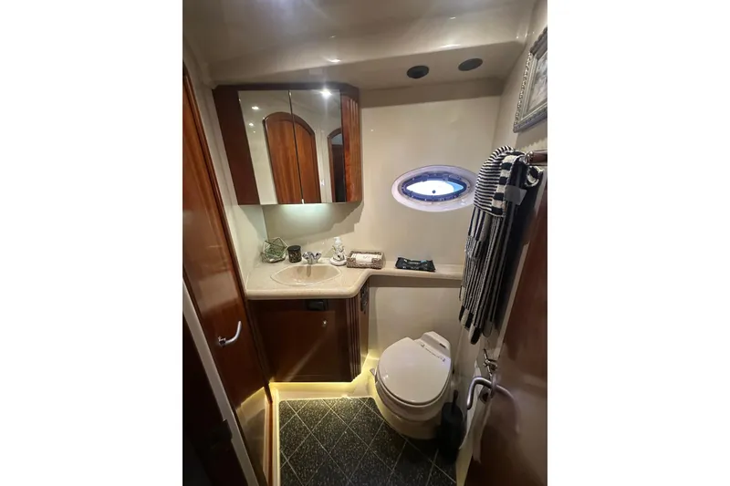 Slide: The Image of Luxurious bathroom in 2008 Cruisers Yachts 415 Express Motoryacht with elegant fixtures. - 18