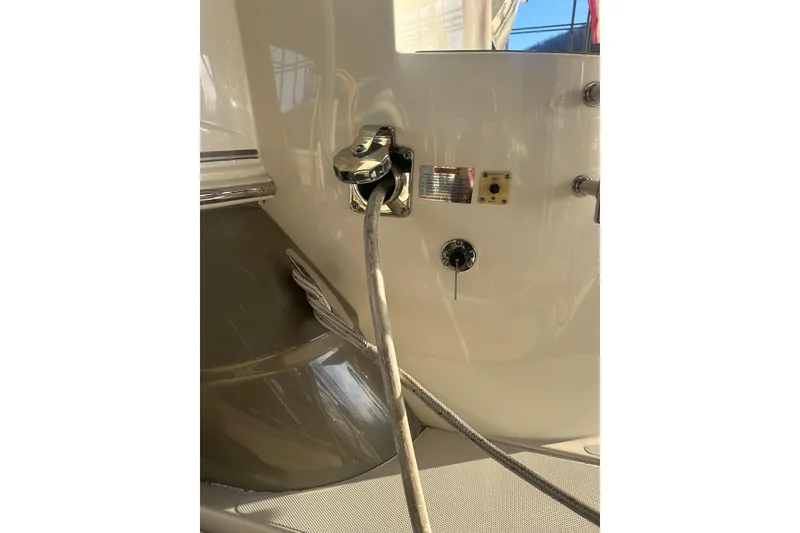 Slide: The Image of 2008 Cruisers Yachts 415 Express Motoryacht deck detail with mooring line and fittings. - 27