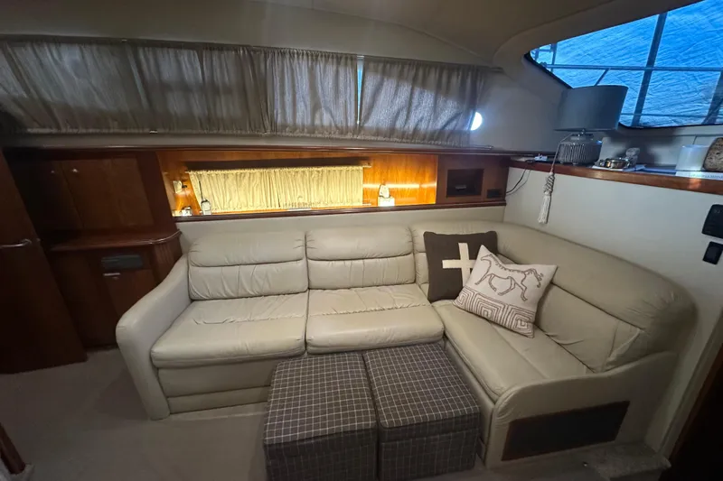 Slide: The Image of Luxurious interior of 2008 Cruisers Yachts 415 Express Motoryacht with plush seating and elegant decor. - 6