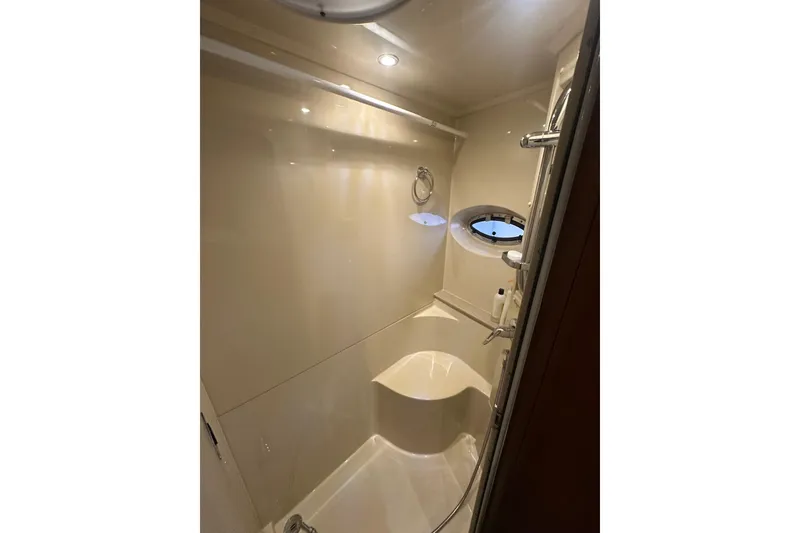 Slide: The Image of Bathroom interior of 2008 Cruisers Yachts 415 Express Motoryacht with porthole and shower. - 19