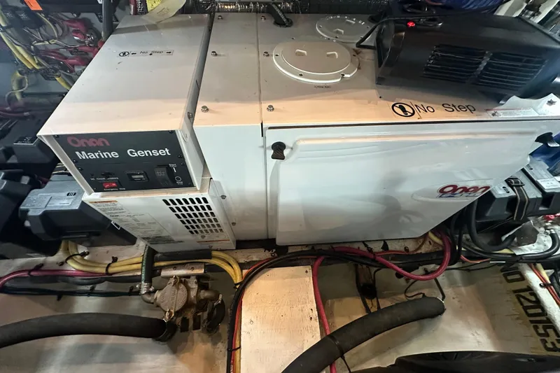 Slide: The Image of Onan Marine Genset in 2008 Cruisers Yachts 415 Express Motoryacht engine room. - 25