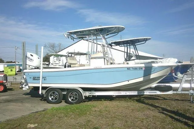 The Image of 2022 Carolina Skiff 21 Ultra Elite boat on trailer, side view. - 1