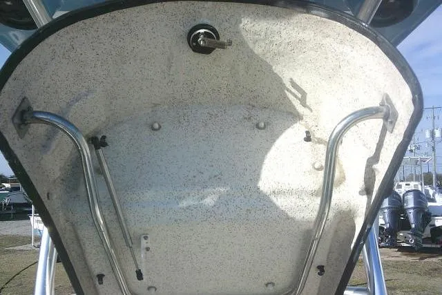 Slide: The Image of 2022 Carolina Skiff 21 Ultra Elite boat canopy underside with metal supports. - 27