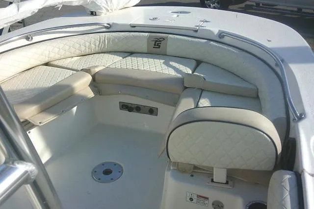 Slide: The Image of 2022 Carolina Skiff 21 Ultra Elite boat interior with cushioned seating. - 29