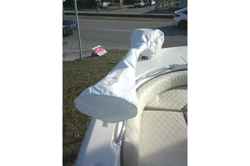 Slide: The Image of 2022 Carolina Skiff 21 Ultra Elite boat with covered anchor on deck. - 31