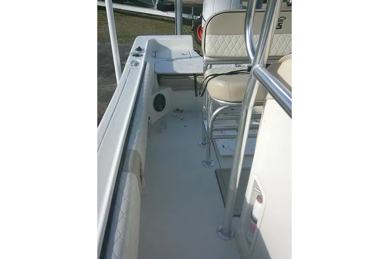 Slide: The Image of 2022 Carolina Skiff 21 Ultra Elite interior with seating and railings. - 33
