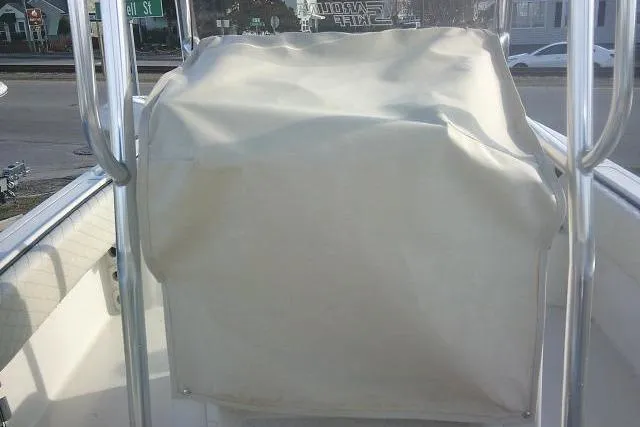 Slide: The Image of 2022 Carolina Skiff 21 Ultra Elite boat console covered with protective fabric. - 40