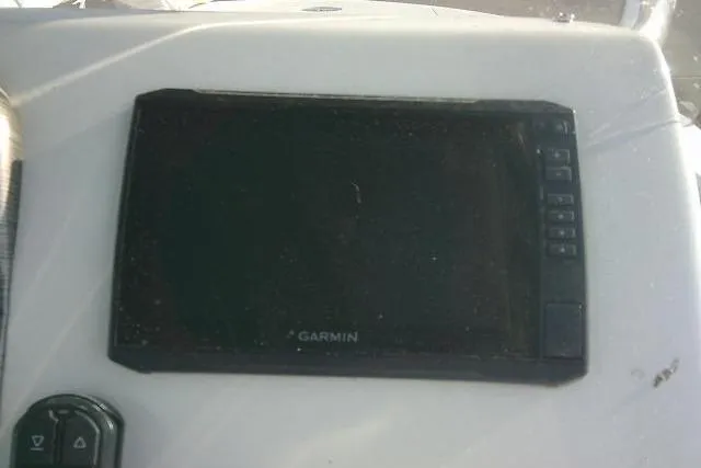 Slide: The Image of Garmin navigation system on 2022 Carolina Skiff 21 Ultra Elite boat dashboard. - 45