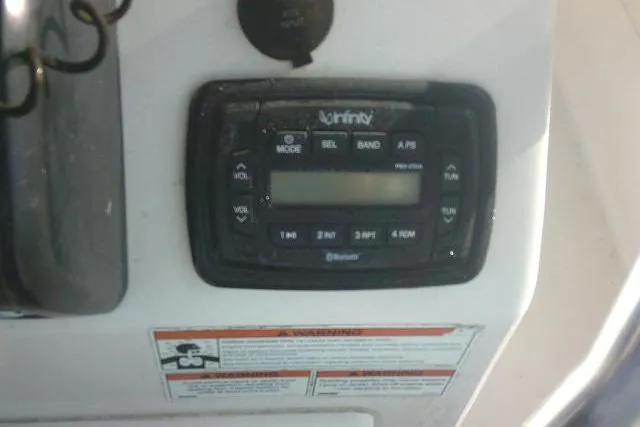 Slide: The Image of Infinity audio system on 2022 Carolina Skiff 21 Ultra Elite boat dashboard. - 46