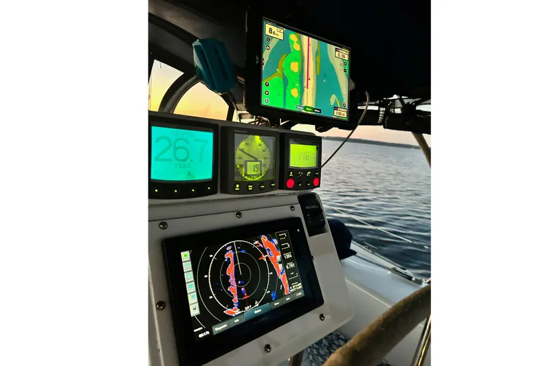 Slide: The Image of Cockpit navigation instruments on a 1999 Catalina 42 MkII sailboat at sunset. - 20