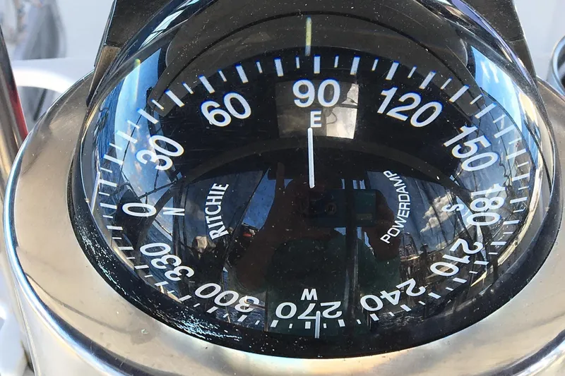 Slide: The Image of Compass on a 1999 Catalina 42 MkII sailboat, showing east direction. - 21