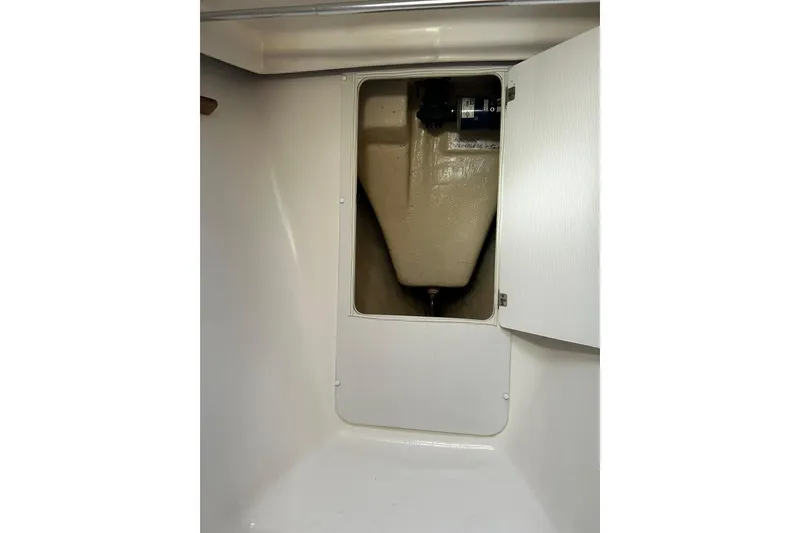 Slide: The Image of 1999 Catalina 42 MkII interior compartment with open access panel. - 27