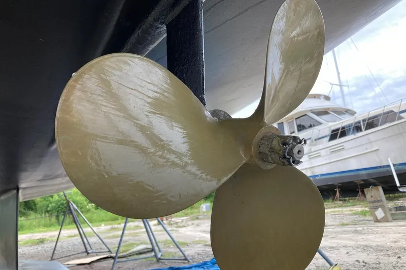Slide: The Image of Close-up of a 1999 Catalina 42 MkII sailboat propeller on dry dock. - 33