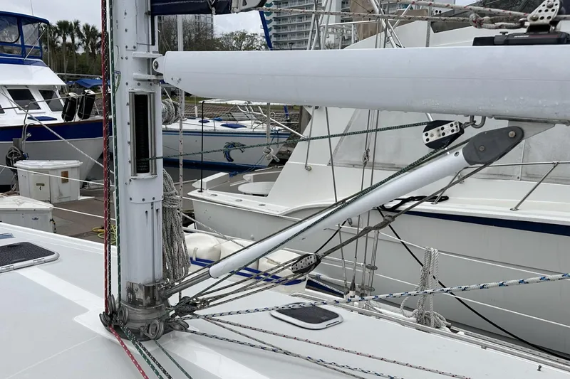 Slide: The Image of Sailboat rigging on a 1999 Catalina 42 MkII, docked with other boats. - 50