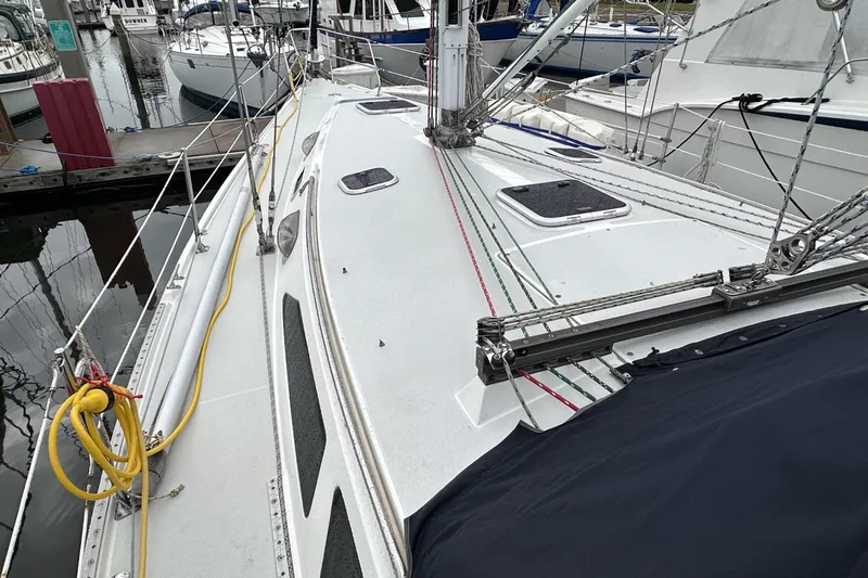 Slide: The Image of Sailboat deck of a 1999 Catalina 42 MkII, docked at a marina. - 51