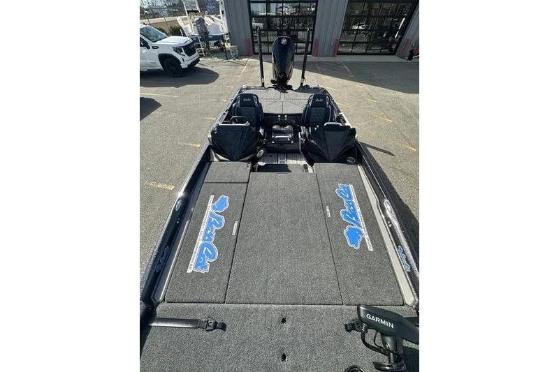 Slide: The Image of 2026 Bass Cat Lynx STS fishing boat with spacious deck and seating. - 9