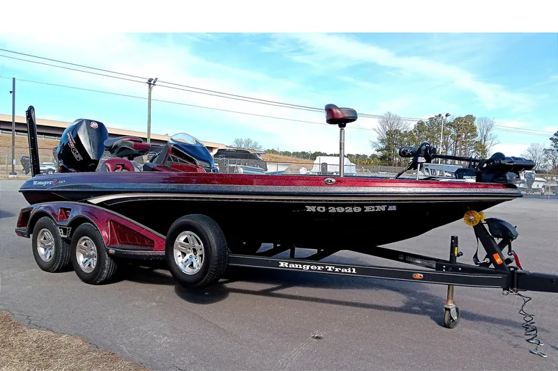 Slide: The Image of 2020 Ranger Z519 boat on trailer, featuring sleek design and powerful engine. - 5