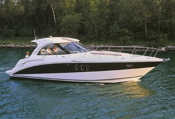 The Image of 2008 Cruisers Yachts 390 Sports Coupe on calm water. - 0
