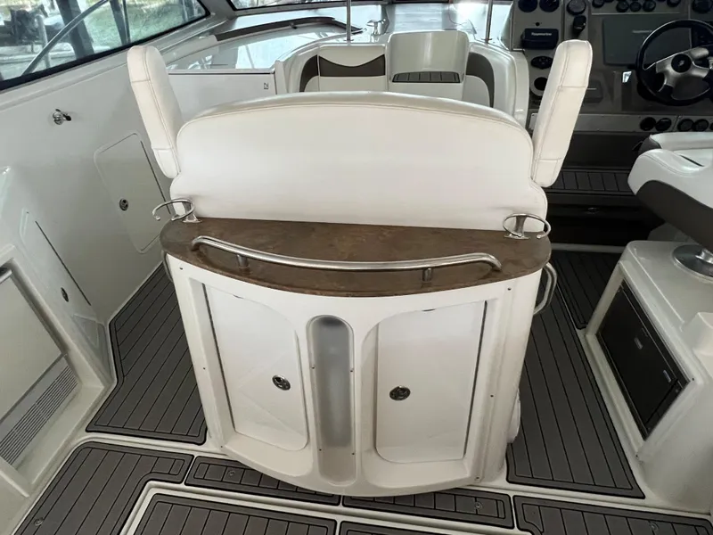 Slide: The Image of 2008 Cruisers Yachts 390 Sports Coupe interior with helm and seating area. - 14