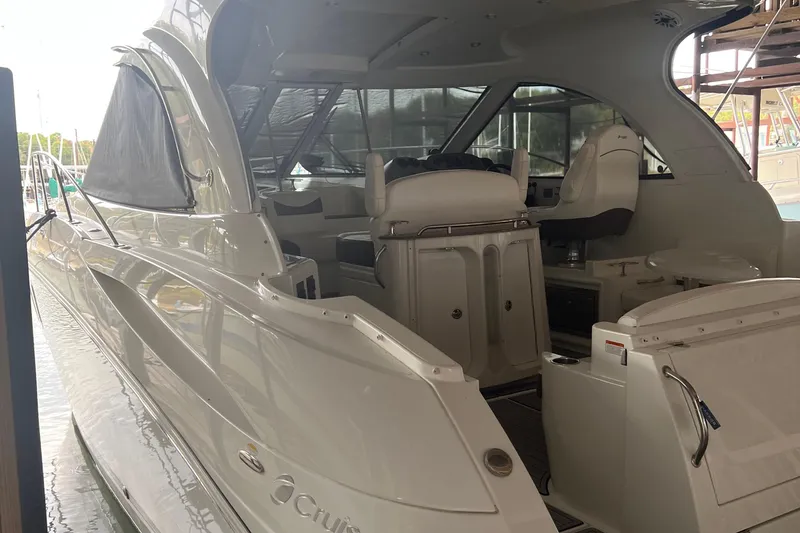 Slide: The Image of 2008 Cruisers Yachts 390 Sports Coupe, sleek design, spacious interior, docked at marina. - 20