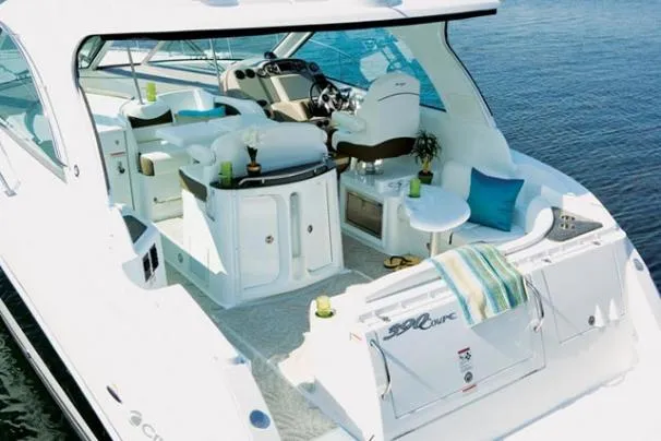 Slide: The Image of 2008 Cruisers Yachts 390 Sports Coupe on calm water. - 4