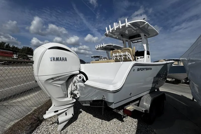 Slide: The Image of 2026 Sportsman Open 232 Center Console boat with Yamaha engine on trailer. - 5