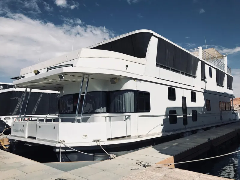 Slide: The Image of 2008 Destination Yachts Cruisin houseboat docked. - 2