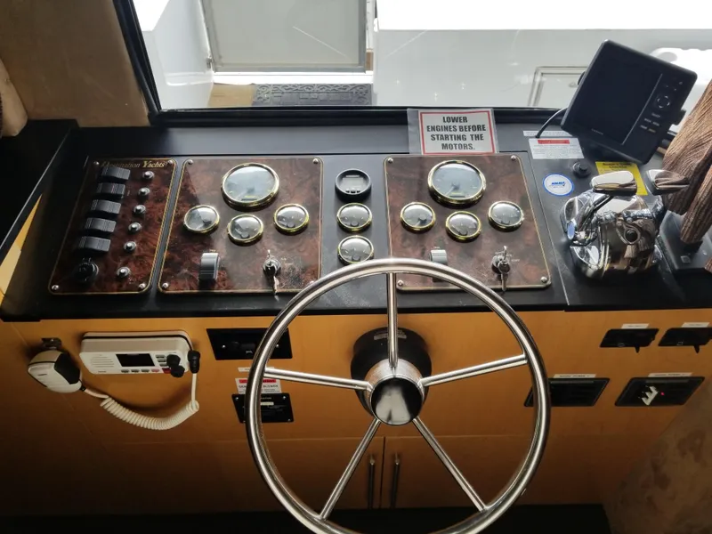 Slide: The Image of Control console of a 2008 Destination Yachts Cruisin yacht. - 12