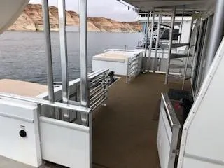 Slide: The Image of Destination Yachts houseboat, Cruisin model, 2008, on a serene lake. - 24