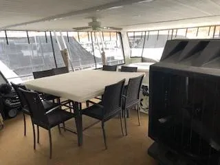 Slide: The Image of Interior of 2008 Destination Yachts Cruisin with dining area. - 34