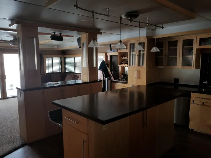 Slide: The Image of Spacious kitchen in 2008 Destination Yachts houseboat. - 7