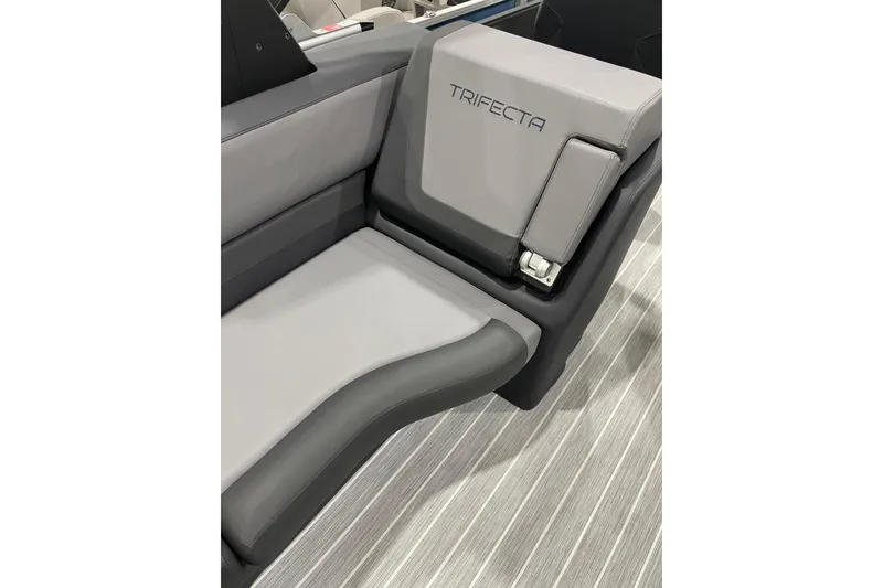 Slide: The Image of 2025 Trifecta 23RFSS boat seat with sleek gray upholstery design. - 12