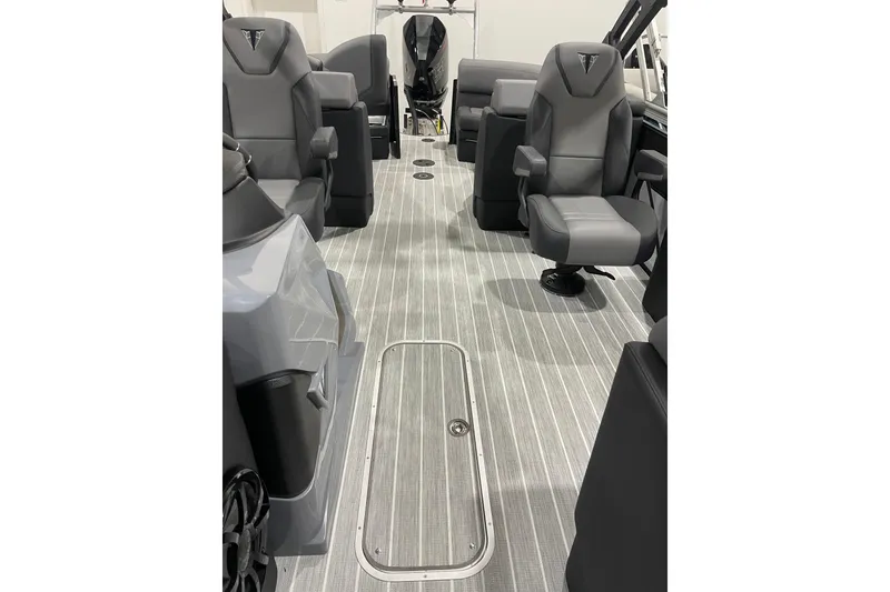 Slide: The Image of 2025 Trifecta 23RFSS boat interior with sleek gray seating and modern flooring. - 5