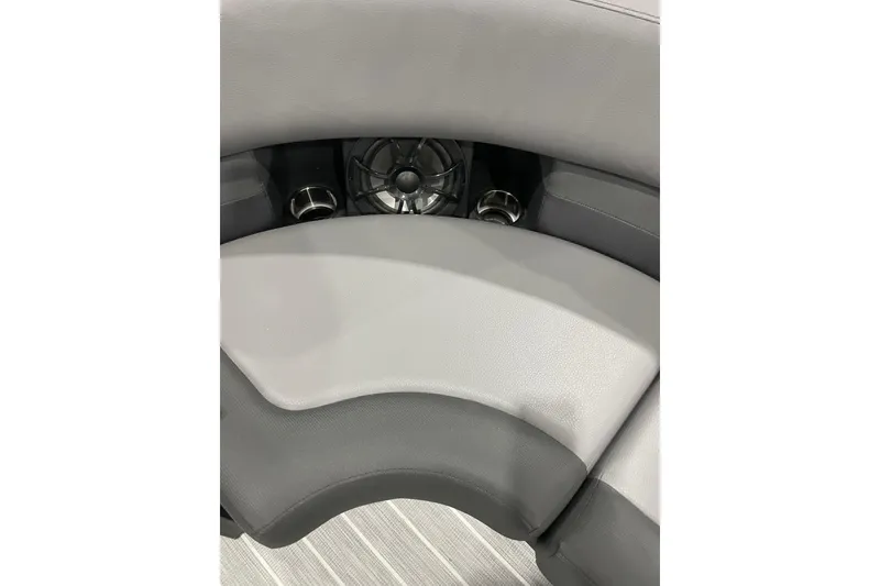 Slide: The Image of 2025 Trifecta 23RFSS boat interior with gray seating and built-in speaker. - 7