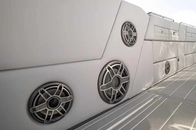 Slide: The Image of 2026 Cigarette 42' Auroris boat interior with sleek speaker system and modern design. - 4