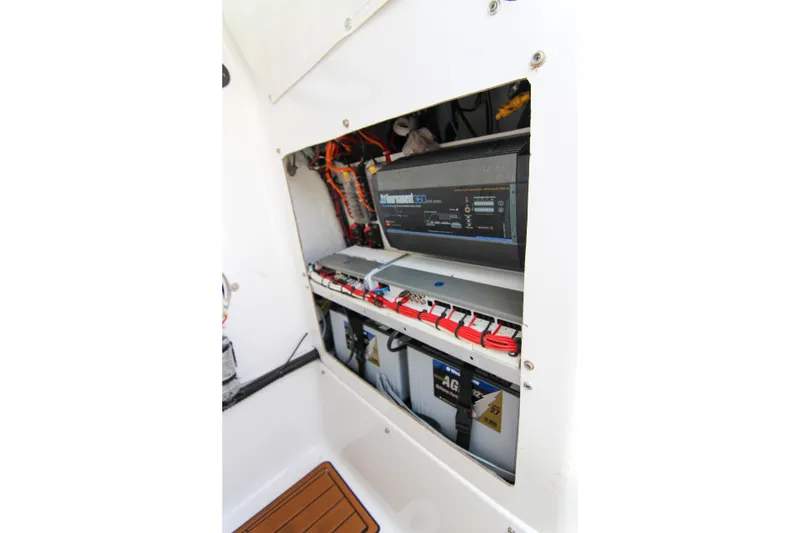 Slide: The Image of Electrical panel inside 2018 Sportsman Heritage 241 Center Console boat. - 18