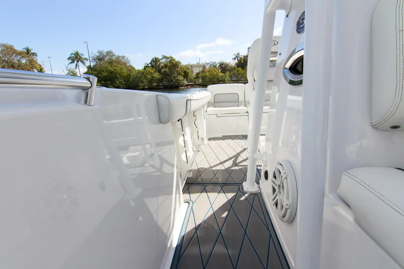 Slide: The Image of 2018 Sportsman Heritage 241 Center Console interior with sleek seating and modern design. - 23