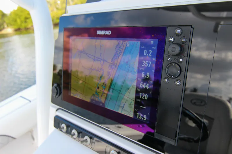 Slide: The Image of Simrad navigation display on 2018 Sportsman Heritage 241 Center Console boat. - 41