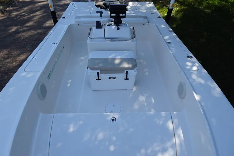 Slide: The Image of 2015 Pioneer 186 Cape Island boat interior with Yeti cooler and console. - 12