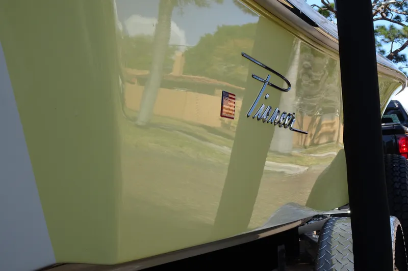 Slide: The Image of 2015 Pioneer 186 Cape Island boat side view with logo and trailer. - 5